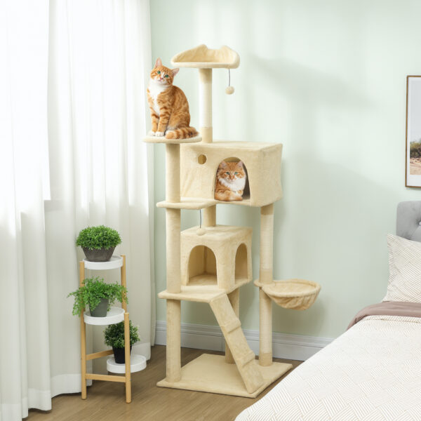 beige cat climbing tower with condos