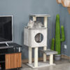 cat climbing tower grey